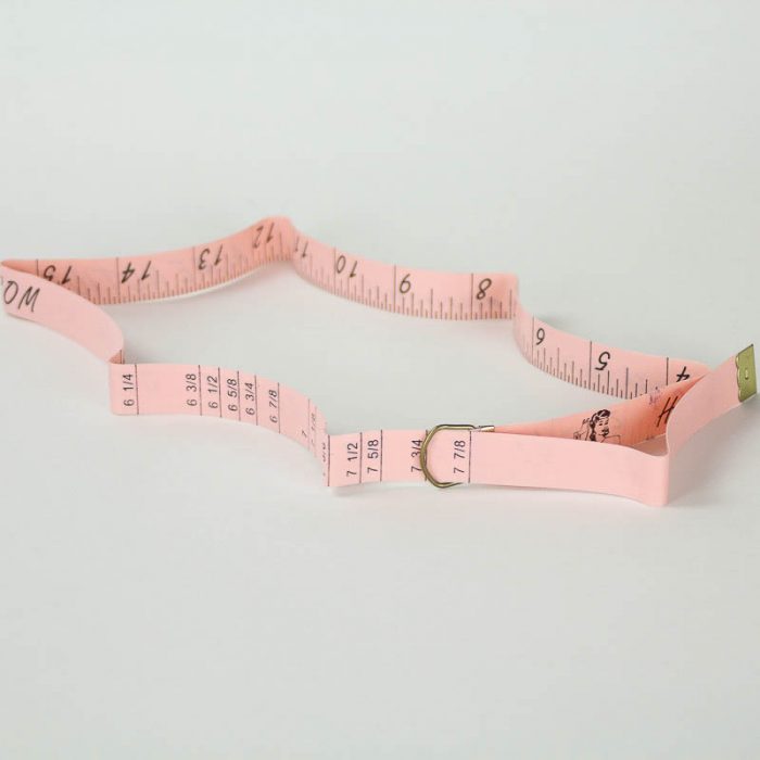 A duo tape makes measuring a head size or hat size easy.