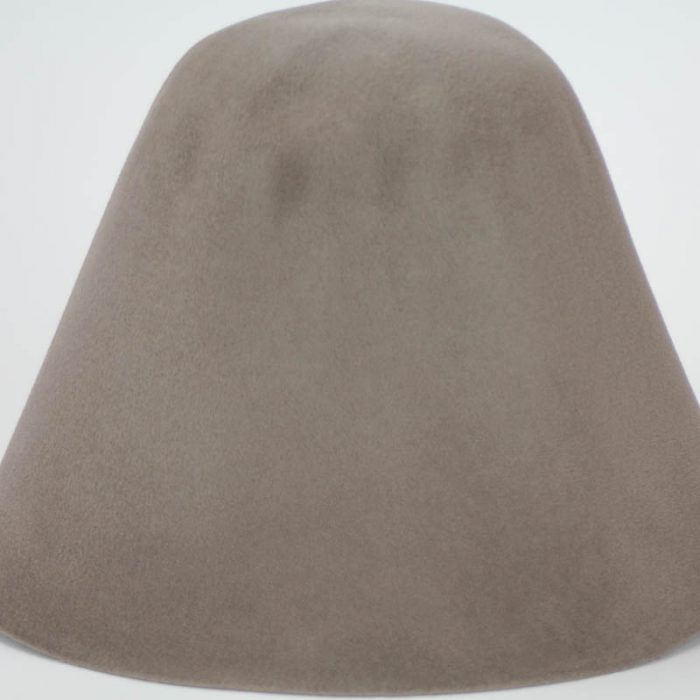 Putty brown, almost black, hood, or cone shape, with velour finish on outside only.