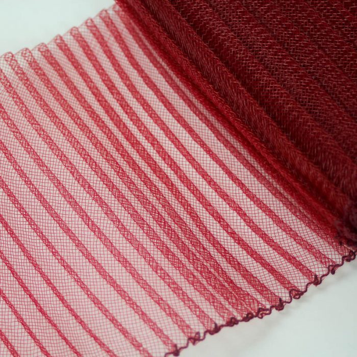 Cranberry Red polyester, very flexible, 1/4 inch pleats.