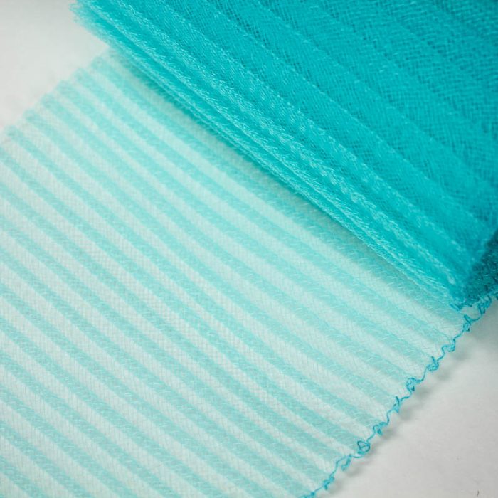 Light Turquoise polyester, very flexible, 1/4 inch pleats.