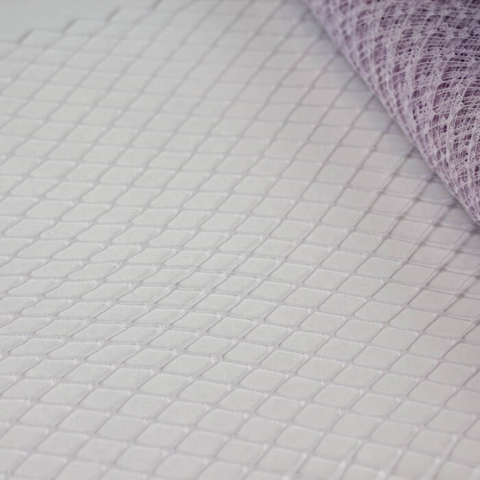 Faded Lilac Standard diamond pattern with 1/4 inch opening, 8-9 inch width and 1/4 inch chenille dots, 100% nylon.